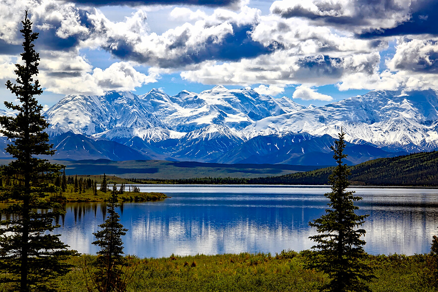 Glacier Mountains Over a Lake